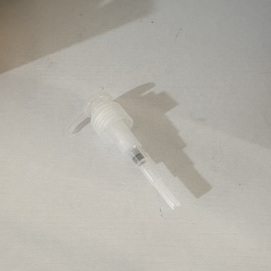 Empty reusable clear liquid dispenser bottle.