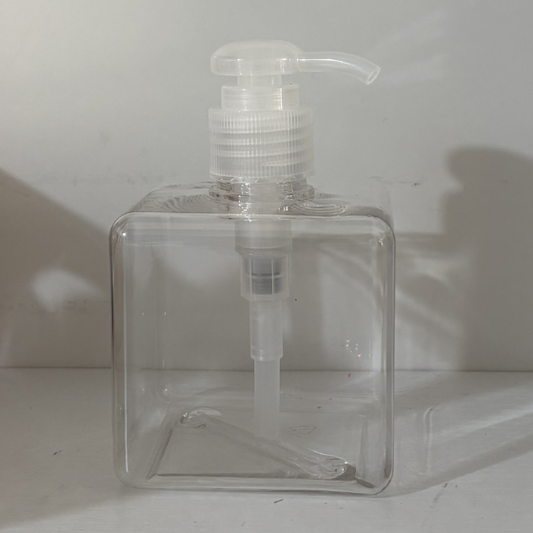 Empty reusable clear liquid dispenser bottle.